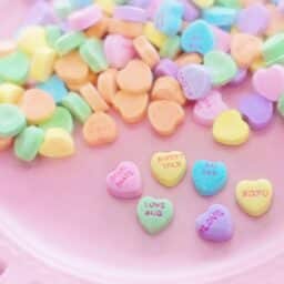 Colorful assortment of heart-shaped candies.