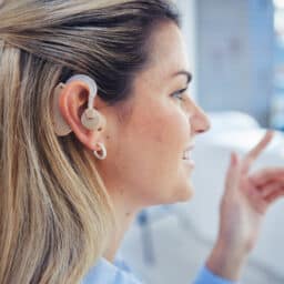 Woman with hearing loss in office