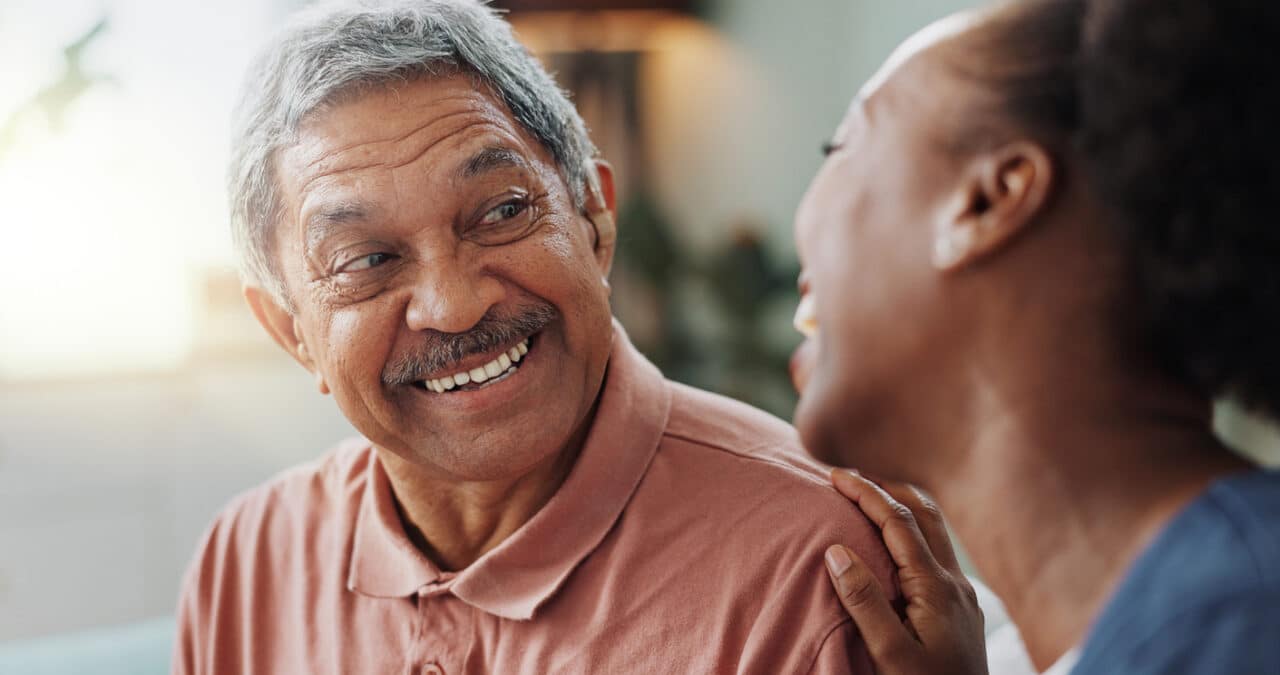 Senior man talking to his daughter.